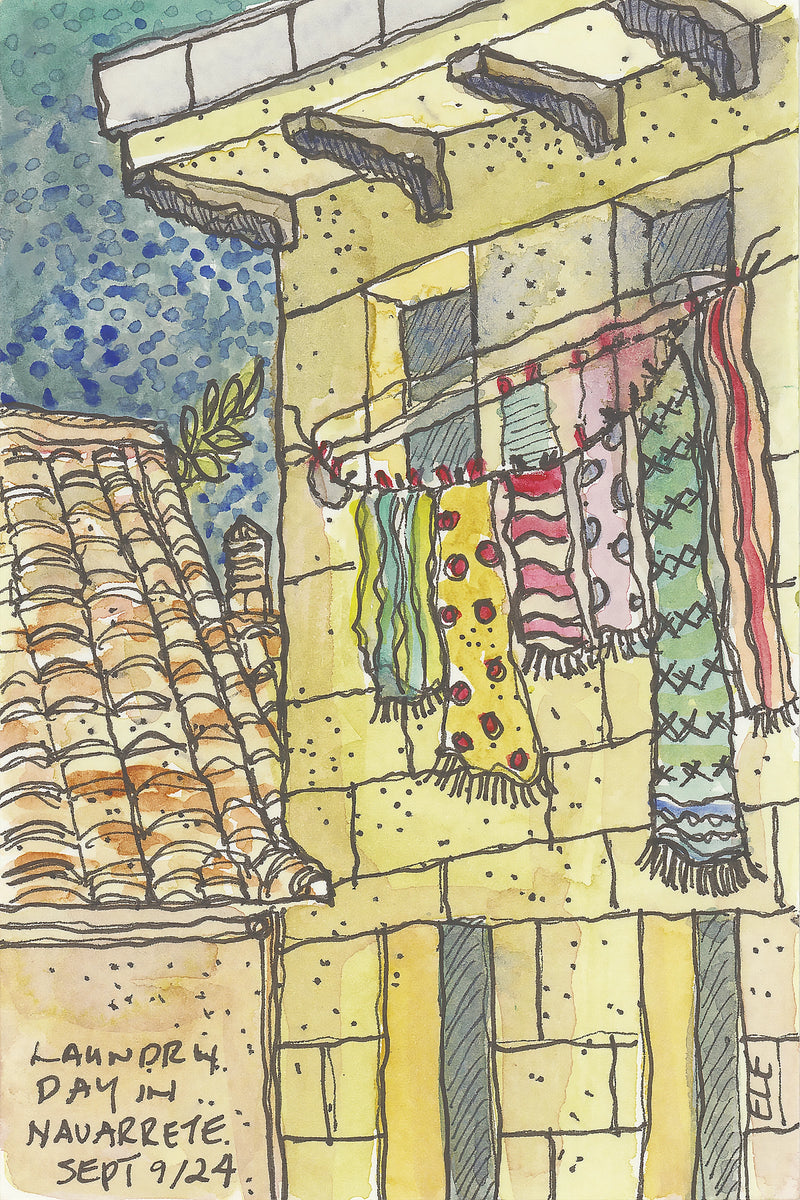Camino watercolor of colorful laundry hanging from a balcony in Navarrete, Spain
