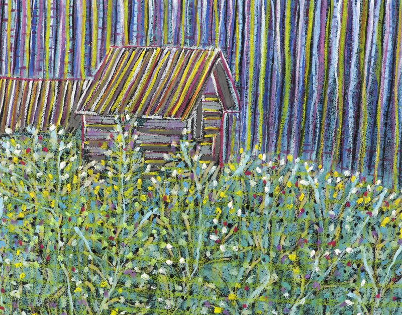 Cabin in a meadow with tall trees behind