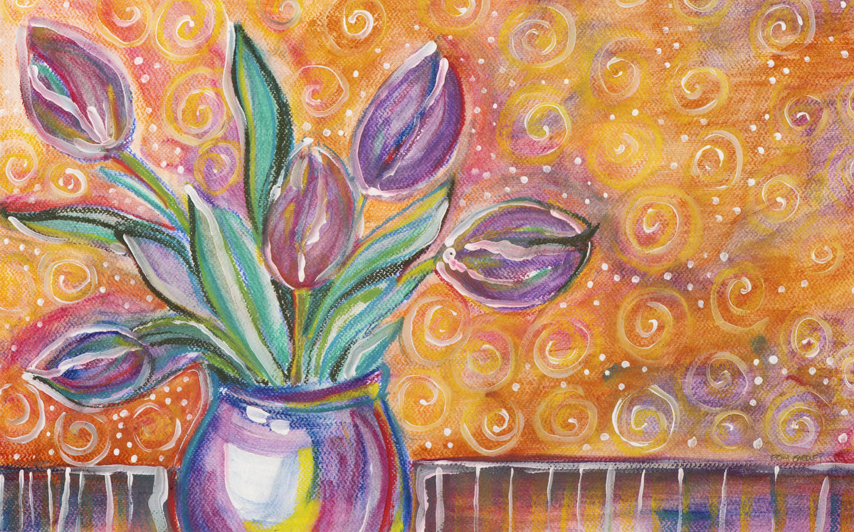 Purple tulips in vase on orange patterned background